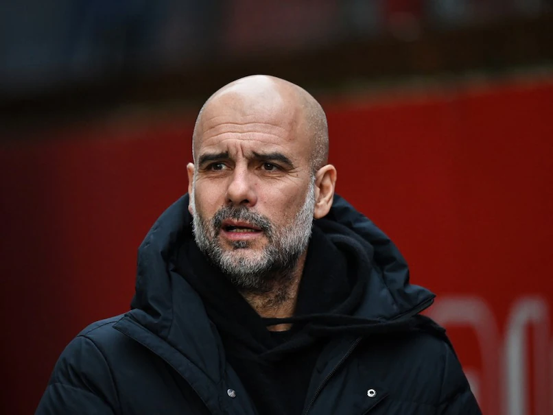 Pep Guardiola Vows to Stay at Troubled Manchester City